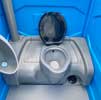 Flushing portaloo showing the toilet bowl and flap